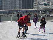  Sonny playing basketball with young players